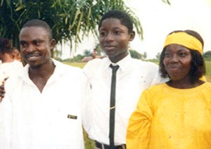 Emmanuel Bessay with his parents