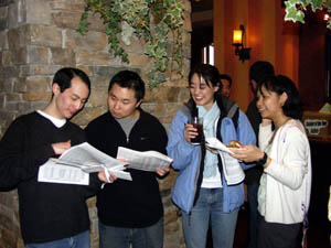 Four students looking at Match lists