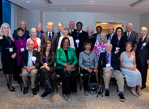 Alumni Weekend Class Dinner Group Photo in soft lighting