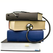 A stethoscope and a stack of books