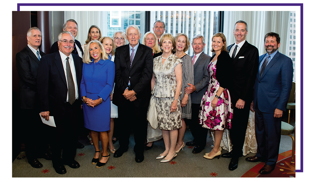 The Snorf and Hicks families pose for a group photo at the 2016 faculty investiture ceremony
