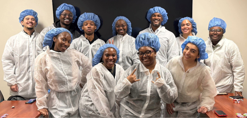 A group of students wearing scrubs