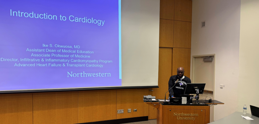 A speaker at a podium