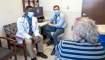 MD students meet with a patient as part of our Education-Centered Medical Home