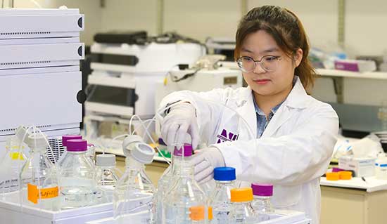 A scientist works in one of Feinberg's wet labs