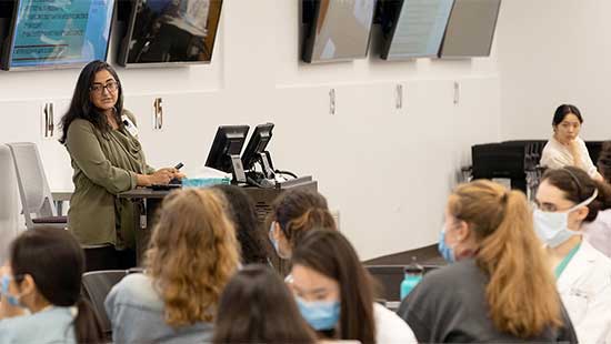 A teacher using technology in the classroom