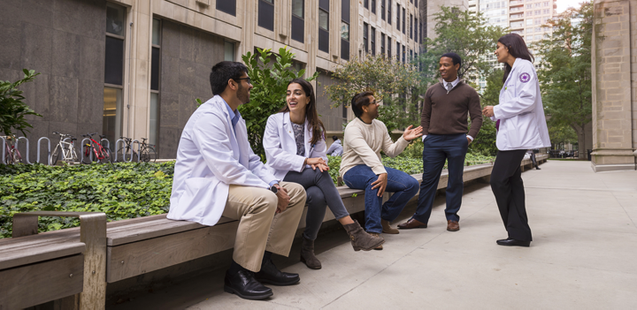 MD students in small group outside Tarry