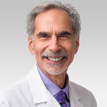 Dr. Kushner in white coat 