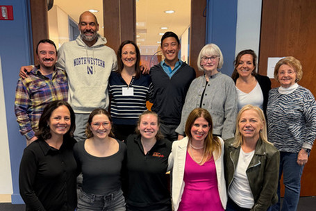 alumni board of directors posing for a photo