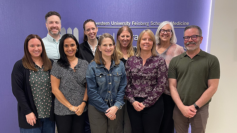 A group of neuro physical therapy faculty posing together.
