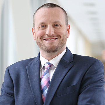 headshot of Matt Temkin, Basic Science Administration executive department administrator