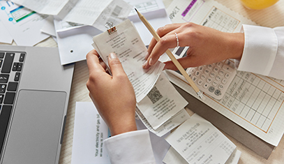 person reviewing receipts