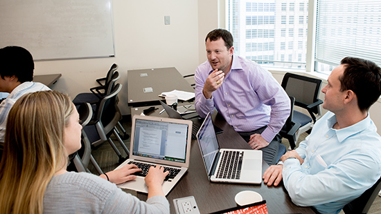 Allen Heinemann and Fellows at a meeting
