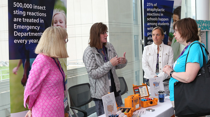 Group of CFAAR researchers discussing findings