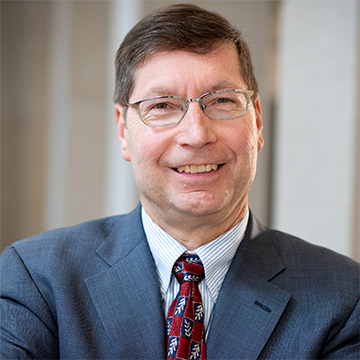 Headshot of Alan Hauser, MD, PhD