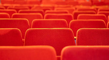 a photo of chairs in an auditorium