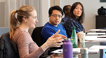 students meeting at table