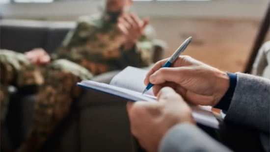 veteran talking to doctor