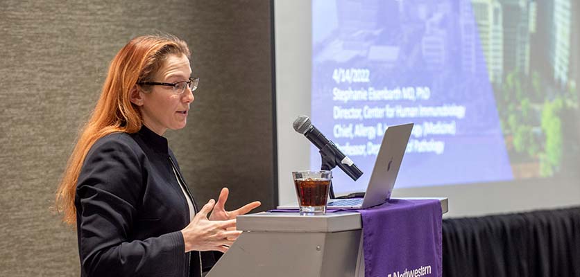 photo of Dr. Eisenbarth giving a presentation to the audience at the retreat
