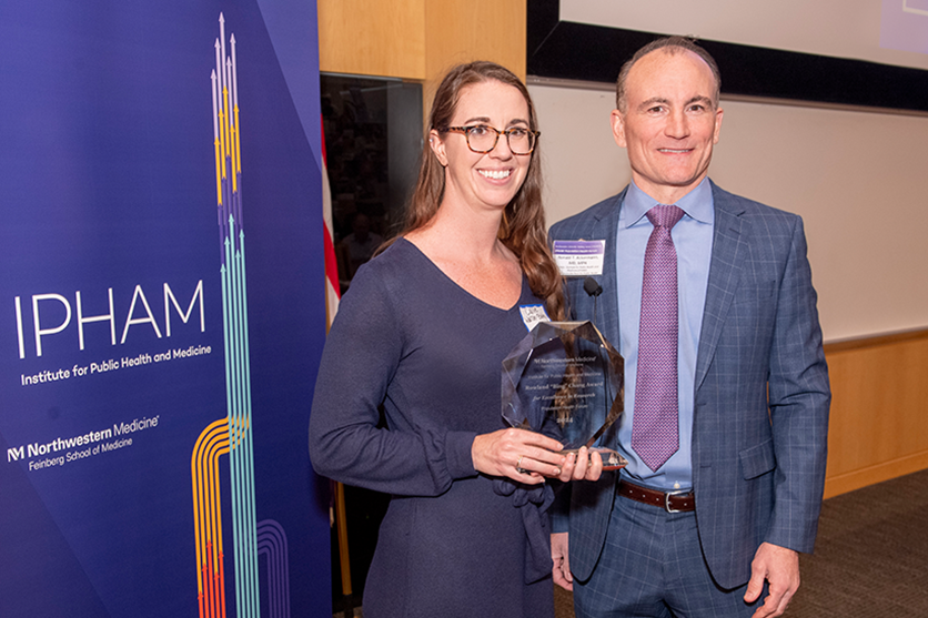 Callie Walsh-Bailey receiving the Ronald Bing award