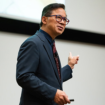William Li speaking at Osher Benefit
