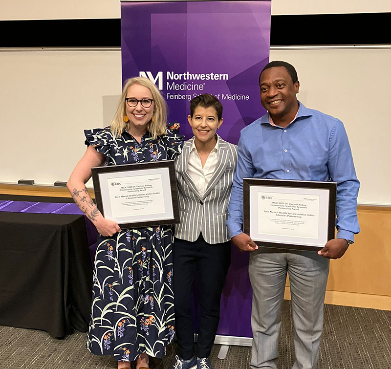 Simons and Knapp receiving award