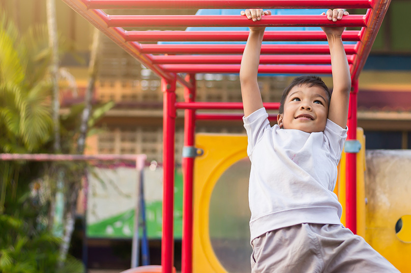 Kid playing on playground