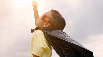 photo of boy with cape 