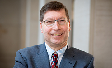 Headshot of Alan Hauser, MD, PhD