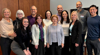 alumni board of directors posing for a photo