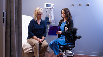 a nurse discussing care with a patient