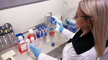 photo of lab tech doing work
